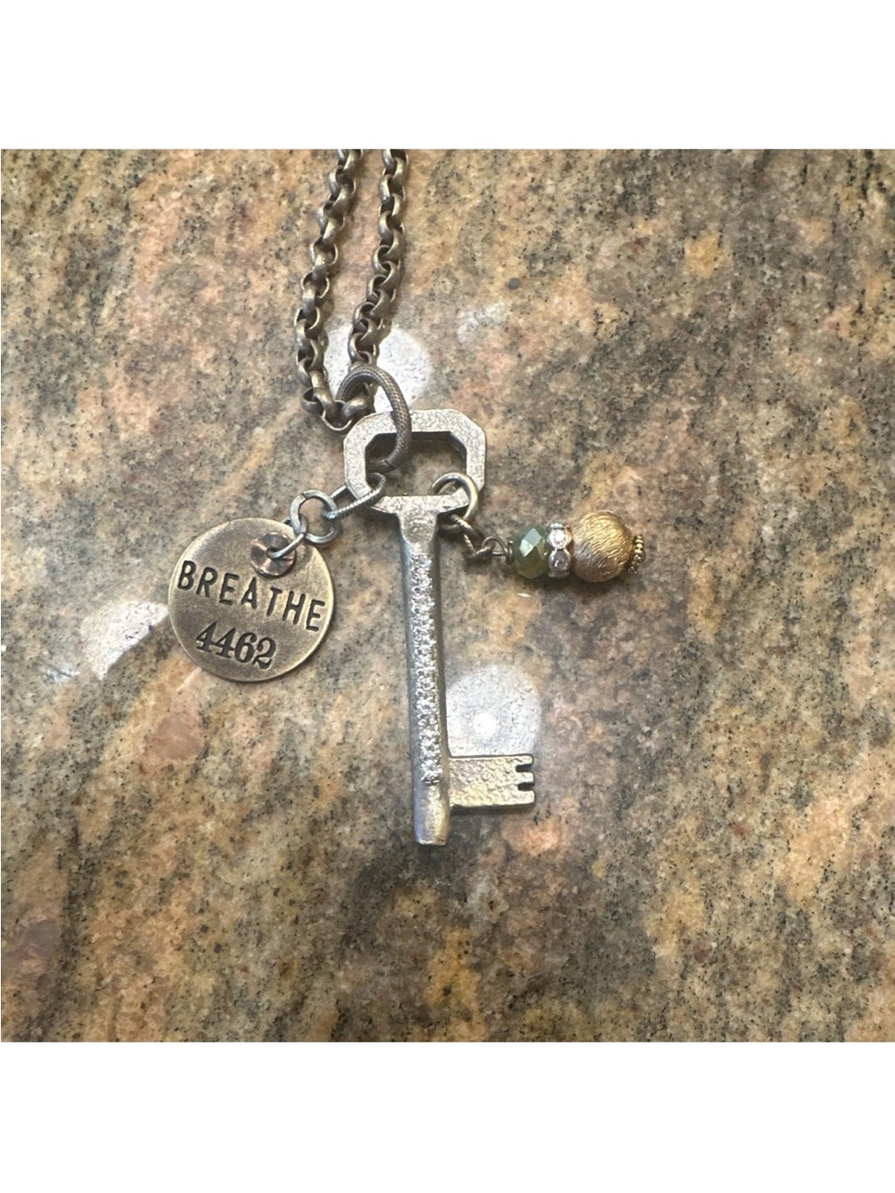 Hand Crafted brass tone Key Necklace with Gold and Green Accents - BREATHE Charm